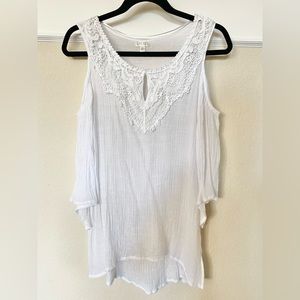 Cold shoulder adorable white summer top. Light weight, a bit see through.